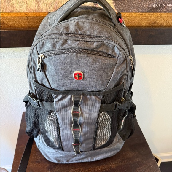 SwissGear Handbags - SwissGear Charcoal and Black Men's Backpack plastic is still on some metal